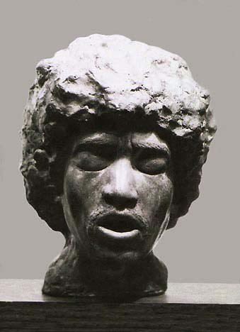 figurative cast stone sculpture.