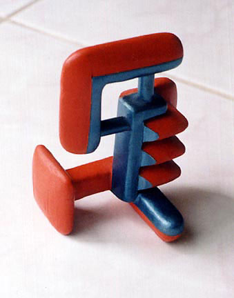 abstract wood and paint sculpture.